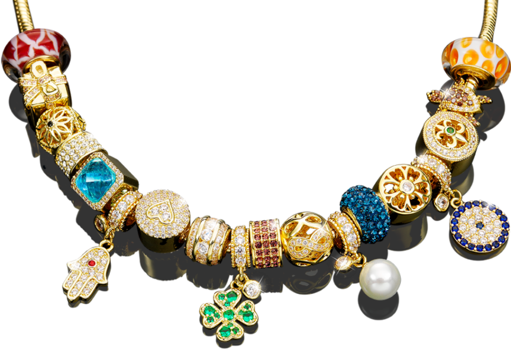 Rubin, Szmaragd, Szafir, kryształy Swarovski, 18-karatowe złoto... HARMONIA to wyjątkowa bransoletka, która łączy modę z najwyższą jakością jubilerską.​